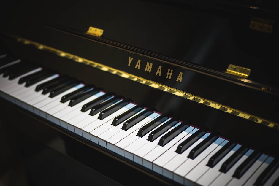 An image depicting a piano keyboard with Middle C prominently displayed